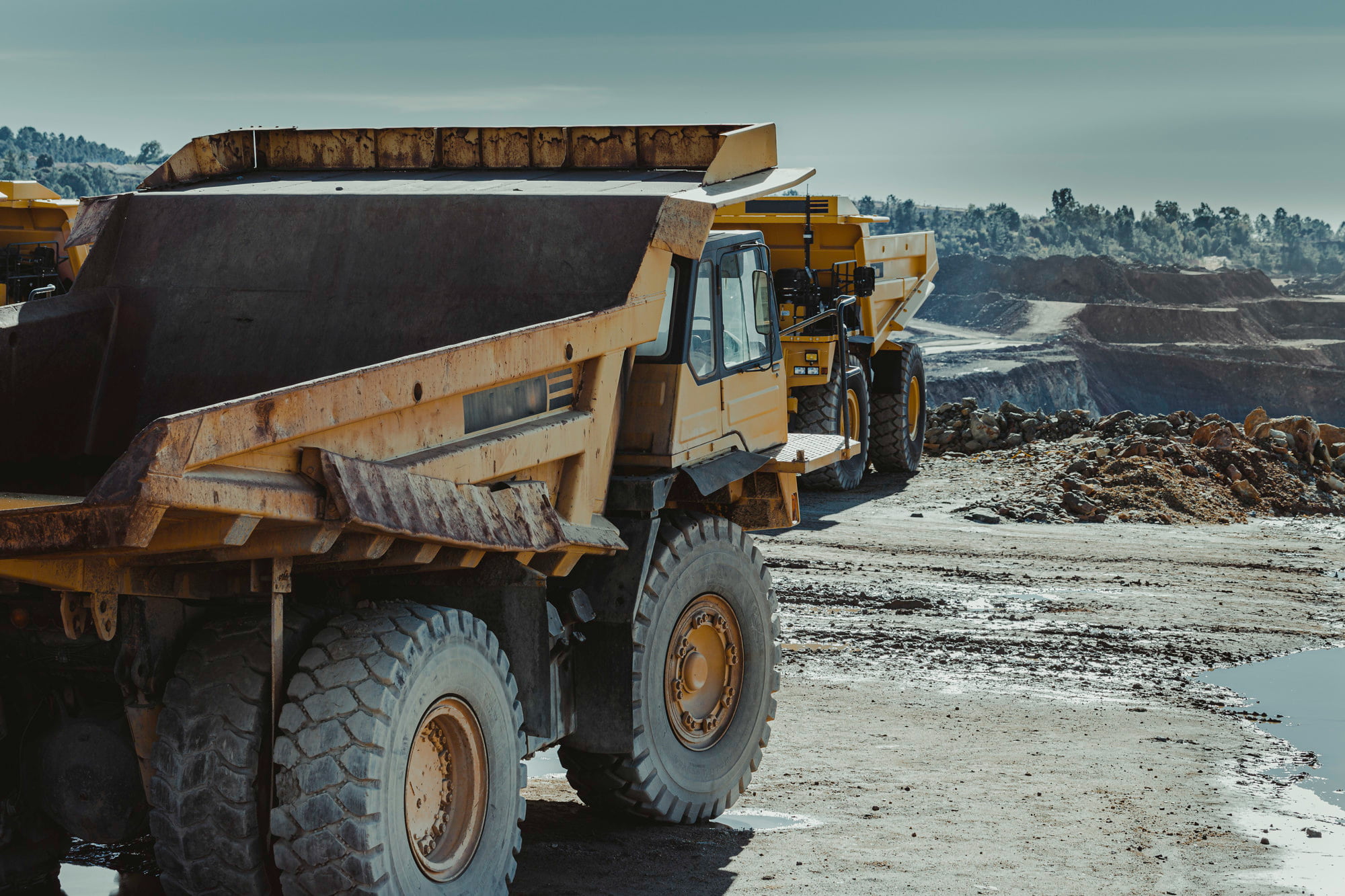 Mining and Material export trucks on site